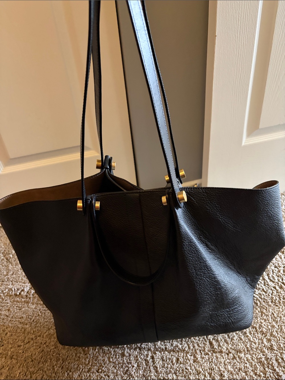All Saints Black Leather Tote Bag with Gold Accents